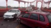 Accidente en el Puente Colgante: Choque, heridos leves y tráfico interrumpido